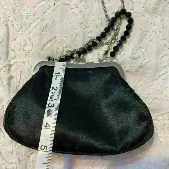 Purse perfect for a wedding or‎ date night. Black with silver accents. - Picture 6 of 8